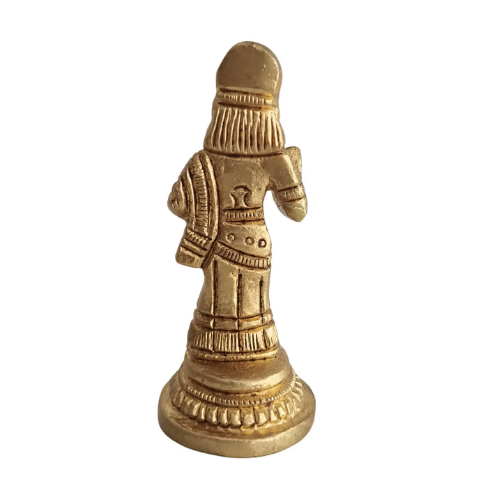 Miniature Goddess Annapoorna Idol in brass, a dispenser of nourishment.