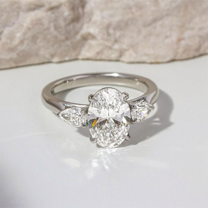 Noble Oval Cut Three Stone Engagement Ring