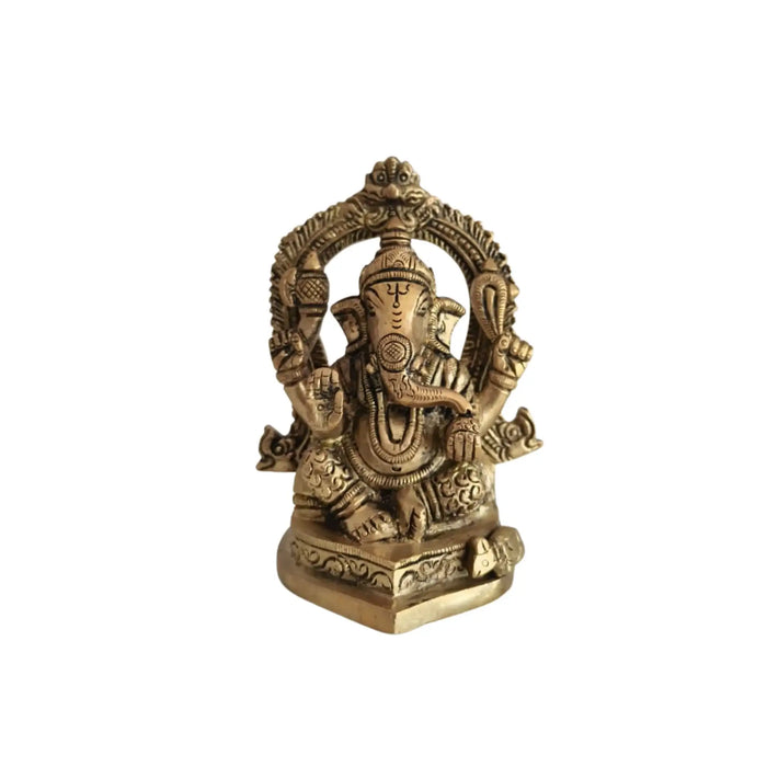 Ornate brass Ganesha and Lakshmi idols, detailed Indian deities.