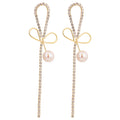 Pearl Earrings with Bowknot Design
