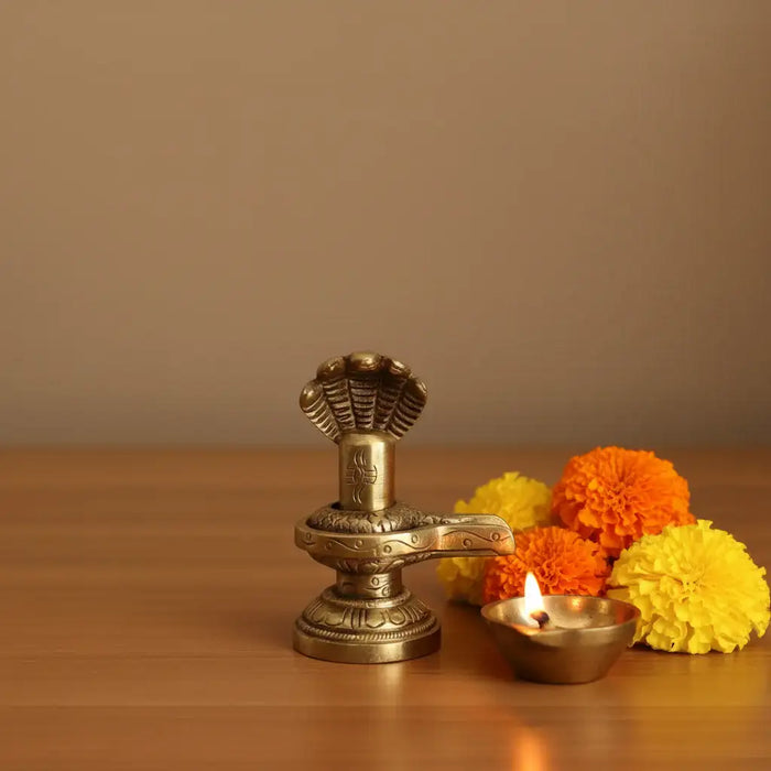 Sacred Brass Shiva Lingam and Yoni Pitha Adorned with Multi-Hooded Naga   Brass Ware