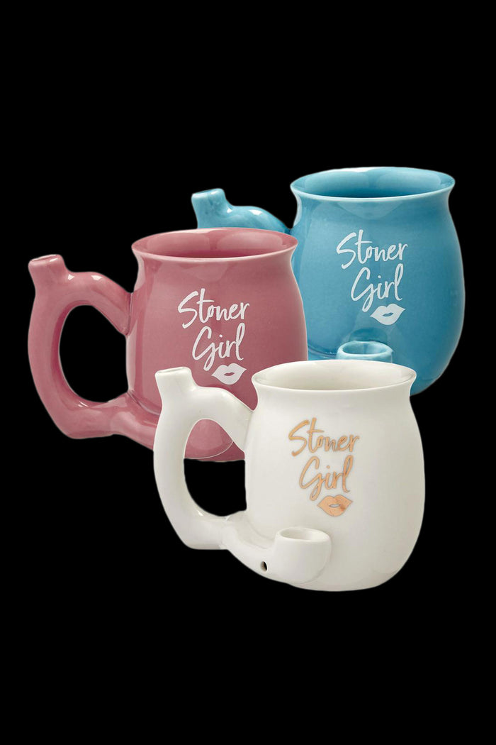 Colorful ceramic water pipes branded with "Stoner Girl" and a lip print.