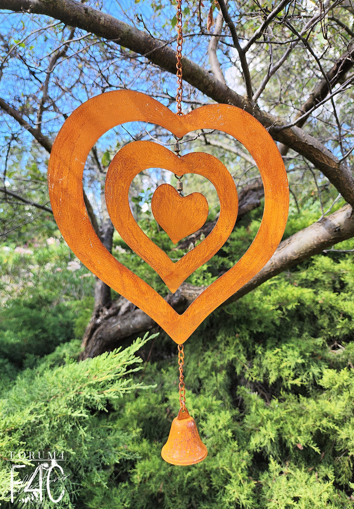 RUSTY HANGING TRIPLE SWIVEL HEARTS WITH BELL