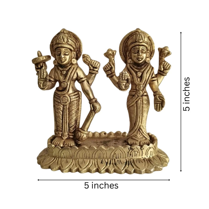Sacred brass Vishnu Lakshmi idol on lotus, divine prosperity symbol.