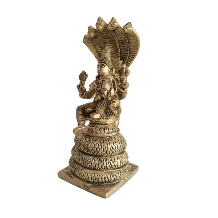 Seated Vishnu Lakshmi statue on brass Sheshnag, religious brass idol.