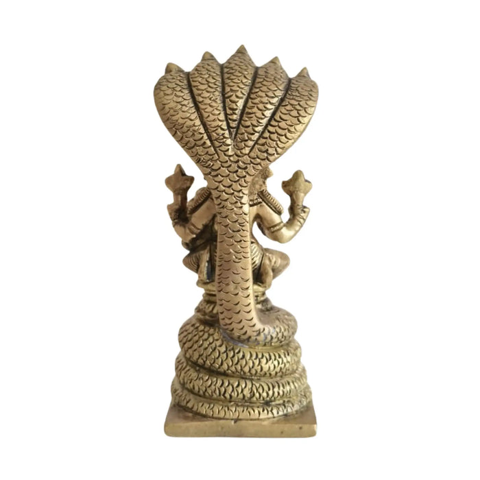 Seated Vishnu Lakshmi statue on brass Sheshnag.