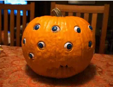 Spooky Halloween Pumpkin Decoration with Rotating Eyeballs