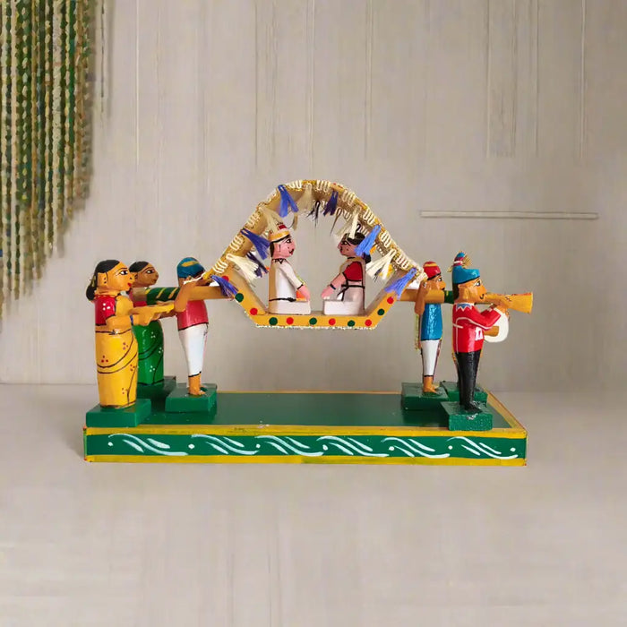 Kondapalli Pelli Pallaki doll showpiece depicting a bridal procession.