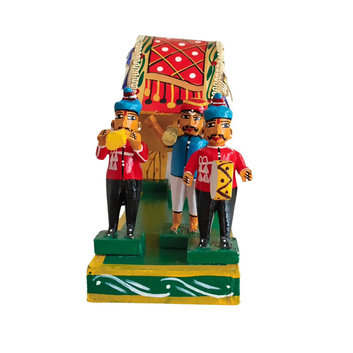 Kondapalli Pelli Pallaki doll showpiece depicting a bridal journey with intricate details.