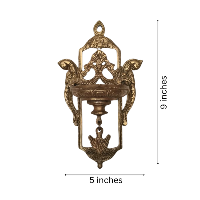 Traditional Brass Peacock Wall Diya – Handcrafted Hanging Oil Lamp   Brass Artwork