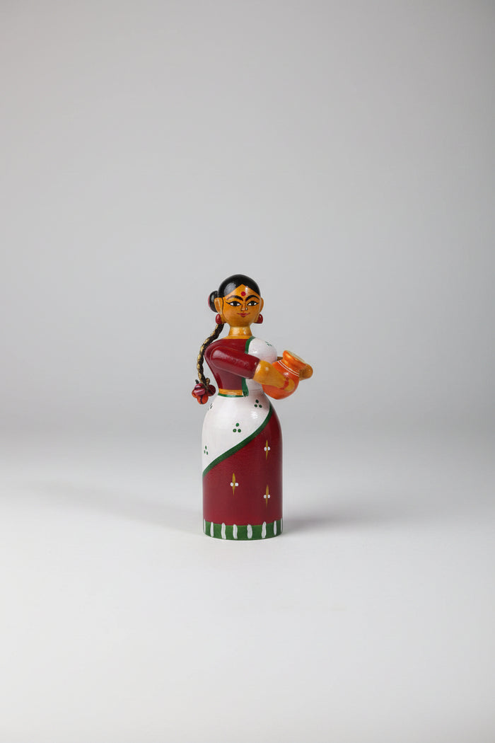 Handmade Etikoppaka wooden doll for home decor and gifts.