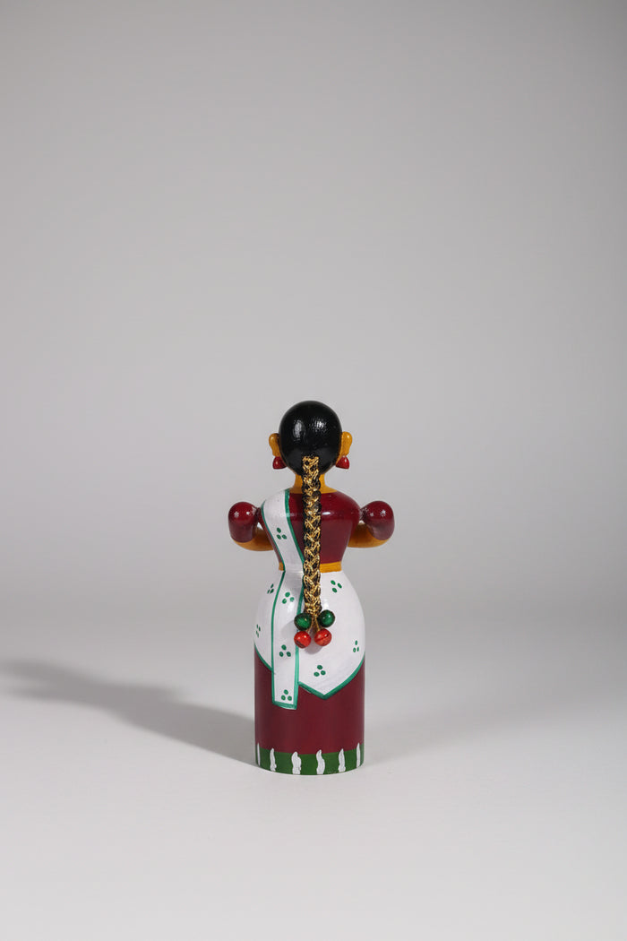 Handcrafted Etikoppaka wooden doll, perfect for home decor and gifts.