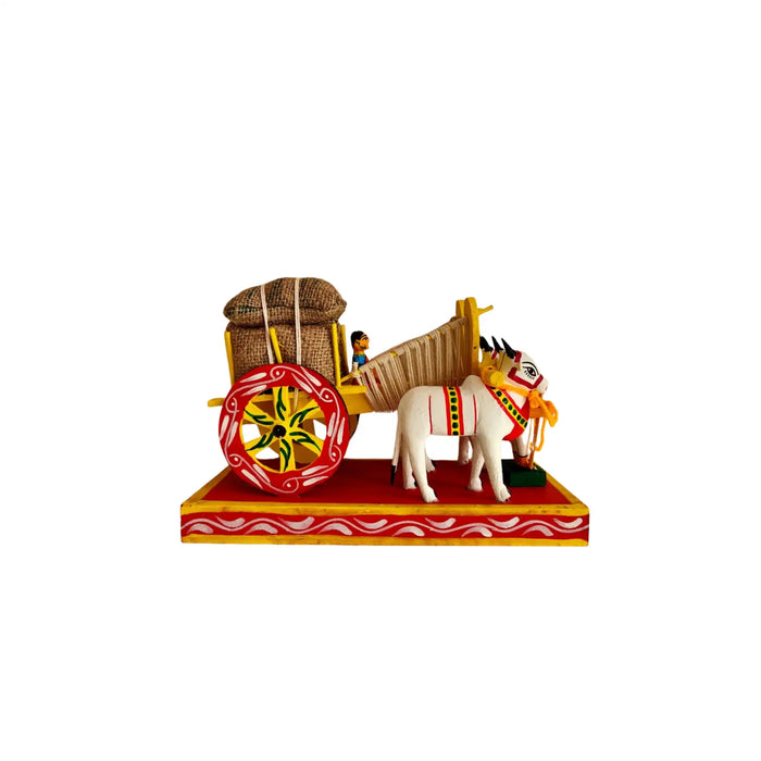 Traditional Kondapalli bullock cart craft, hand-painted wood, village life depiction.