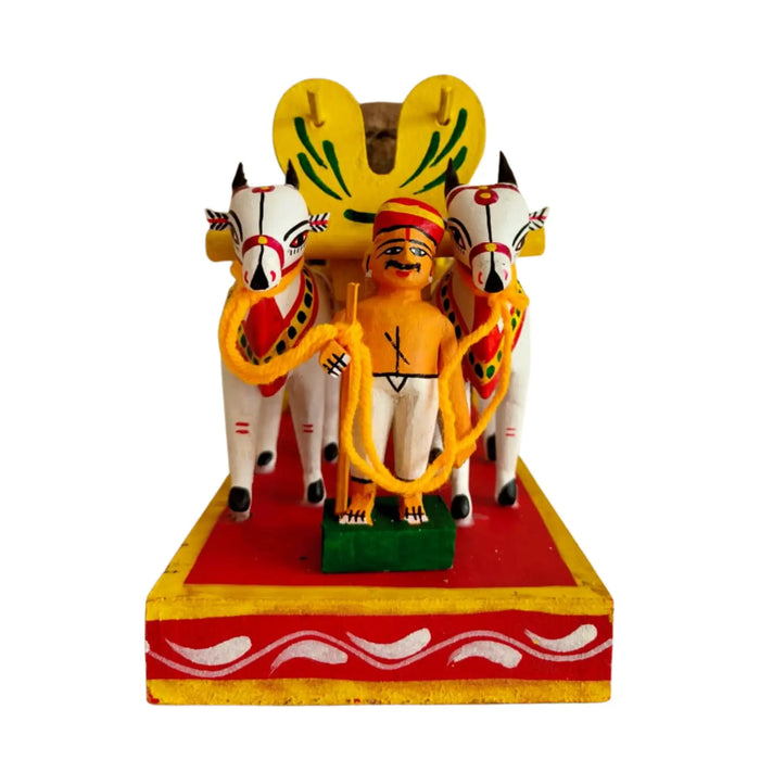 Traditional Kondapalli Bullock Cart wooden craft, depicting village life.
