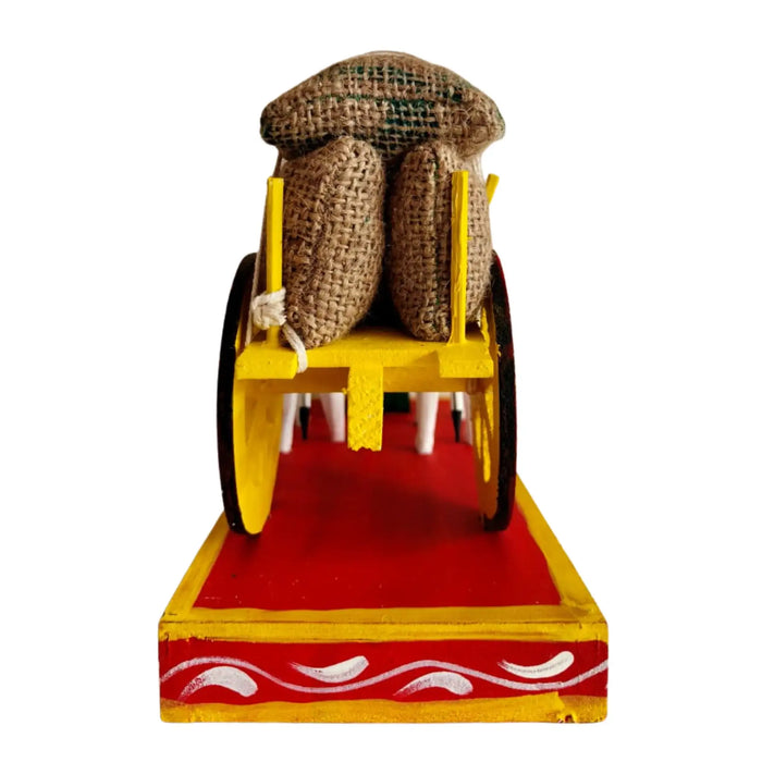 Traditional Kondapalli Bullock Cart wooden craft depicting village life.