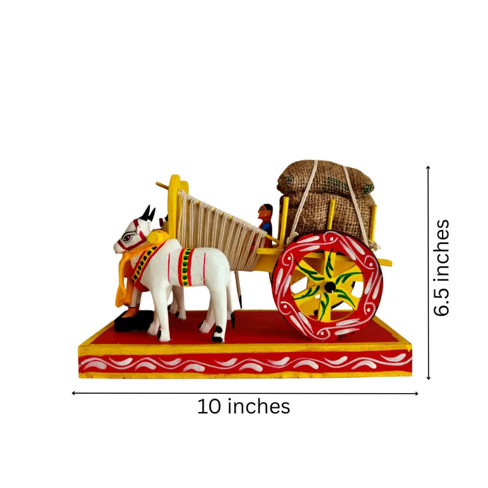 Hand-painted wooden traditional Kondapalli bullock cart craft, depicting village life.