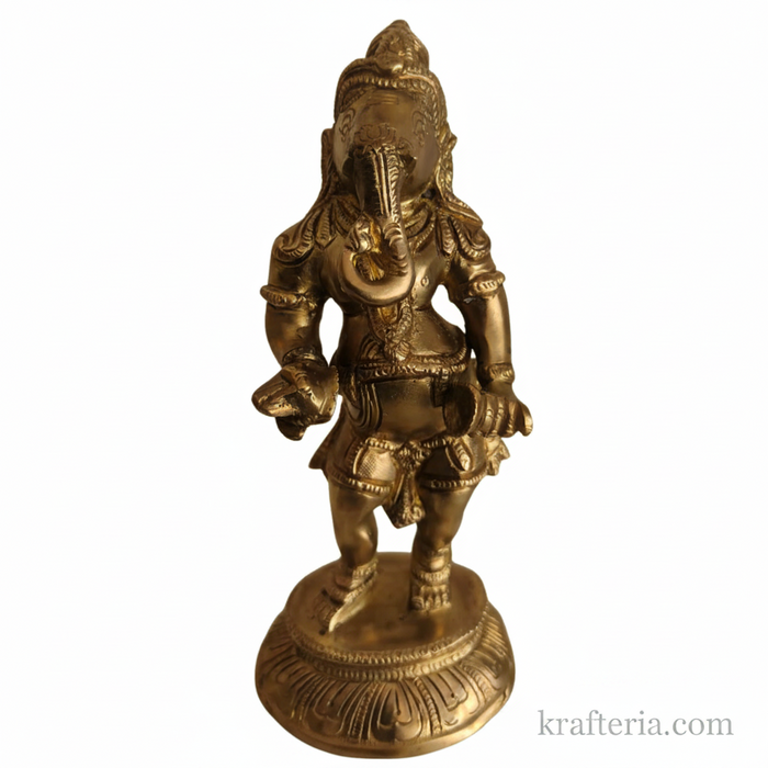 Brass Ganesha cymbals idol, traditional altar statue.