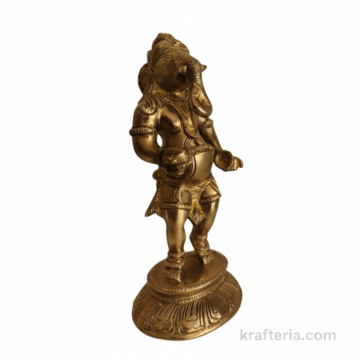 Brass Ganesha cymbals idol, traditional altar statue of Lord Ganesha playing cymbals.
