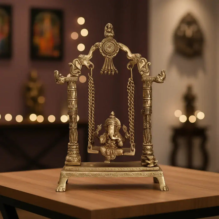 Unique Brass Lord Ganesha on Swing (Jhula): Idol of Joy, Playfulness, and Auspiciousness   Brass Ware