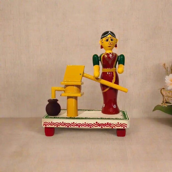 Village Woman at the Water Pump – Etikoppaka Wooden Craft   Etikoppaka Lacquerware